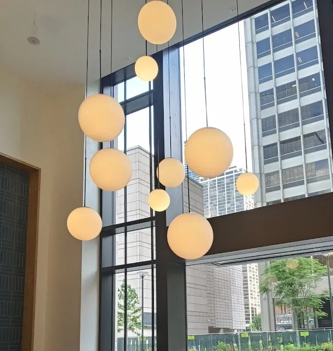 Swag Chandelier: Brass Chain with Neckless Globe Shades